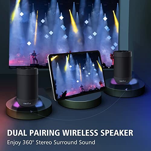 Dual pairing wireless speaker with surround sound in front of a concert screen