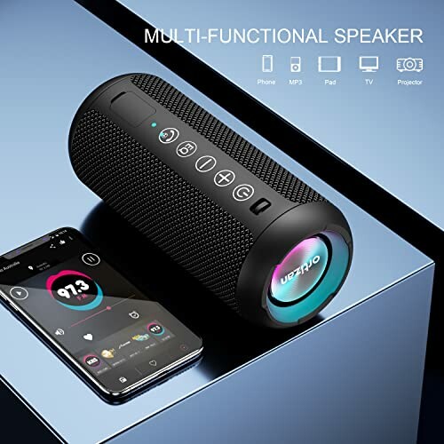 Portable Bluetooth speaker with smartphone displaying app interface